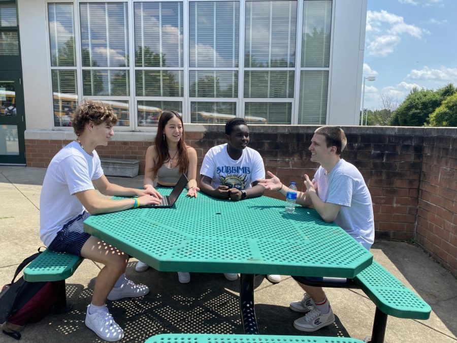 (Left to Right) Next year's SGA officers juniors Ethan Mendes, Lauren Kim, Bryan Kibet and Luke Liden discuss the homecoming video for next year. Many of these meetings have been held by the officers to start planning for next year.