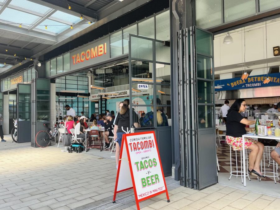 The windows at Tacombi open to let summer air into the bright restaurant serving lunch. People dined in on varying occasions, including birthdays, and reunions.