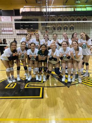 The team celebrates its win against Richard Montgomery Tuesday night. Wildcats beat the Rockets 3-1 and will next face BCC Barons.