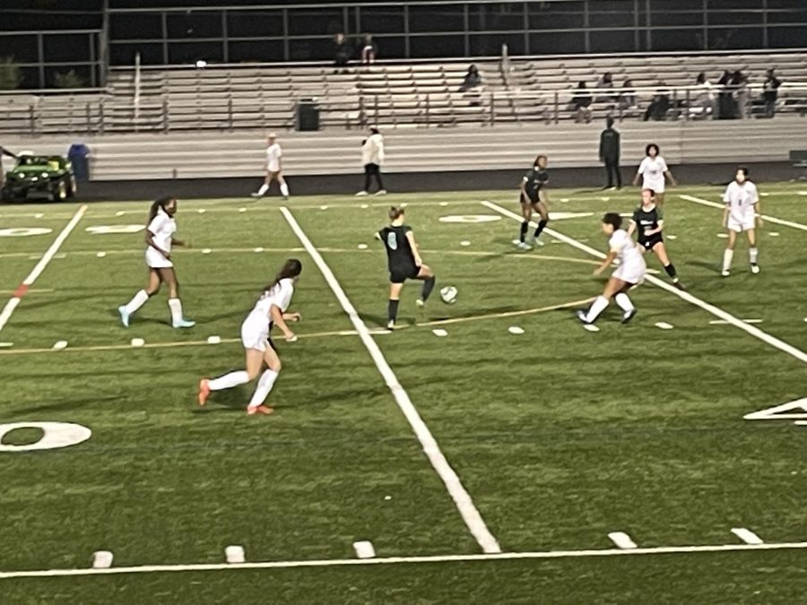 Senior captain and midfielder Vivian Vendt sets up a play downfield for the Wildcats. The Wildcats were able to set up many scoring opportunities in their destruction of the Screaming Eagles.