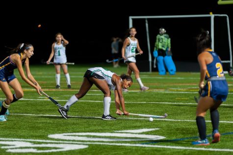 Junior midfielder Lilly Delp clears the ball and tries to set up a scoring opportunity for the Wildcats downfield. The Wildcats lost to the Barons 4-1.