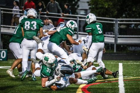The defense makes a tackle to stop Whitman from gaining yards. The Wildcats defense held the Vikings to only six points the entire game. The Wildcats hope to stay successful in week three against Quince Orchard.