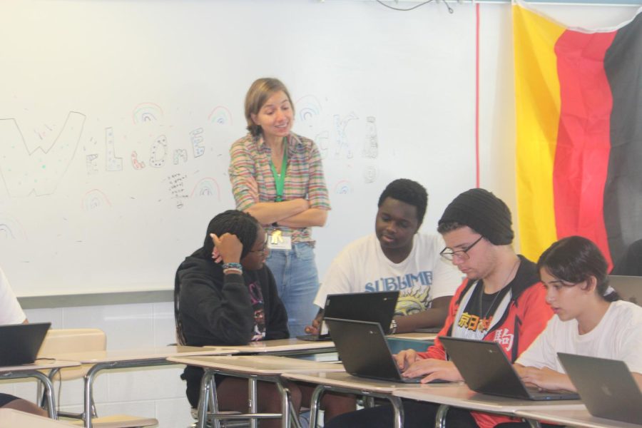 Dr. Katharina Matro instructs students while teaching her third period personal finance class. Classes such as personal finance, quantitative literacy and financial literacy help students gain real world skills to help them outside of high school.