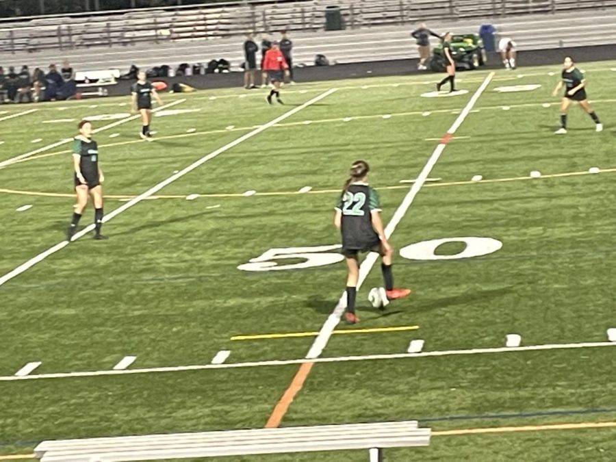 Junior midfielder/defender Katie Dutko passes the ball back to senior captain and defender Isabella Mondelli. The Cats start division play this week against Wootton and RM. “This week’s games are going to be the most entertaining games so everyone should come out and watch, senior captain and midfielder/forward Aranda Hurge said.