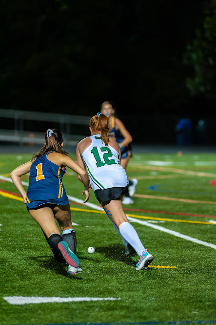 Sophomore forward Gillian Rosenstock takes the ball past a Barons defender. The Cats were able to score one goal early in the fourth quarter.