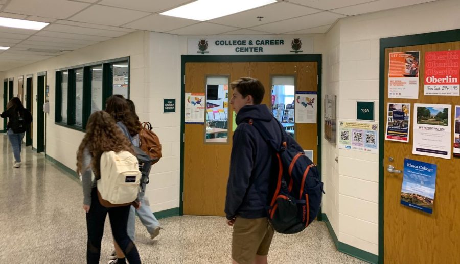 Students pass by the College and Career Center on their way back from lunch. As seniors gear up for the college application process, the critical decision of how many schools to apply to can play a significant role in determining both the magnitude of their workload and the number of colleges they will be able to choose from.