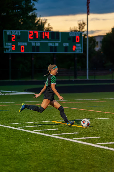 Senior captain and midfielder Vivian Vendt takes a free kick. Her pass connected with freshman Evie Avillo who shot the ball into the net for the Wildcats third goal of the night. The Wildcats beat the Blake Bengals 9-0.