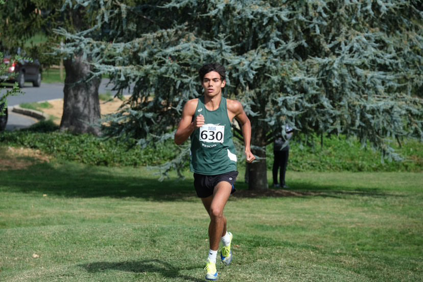 Junior Calix McCormick paces himself in the Invitational. He finished 9th overall and led the boys to a 3rd place overall finish.