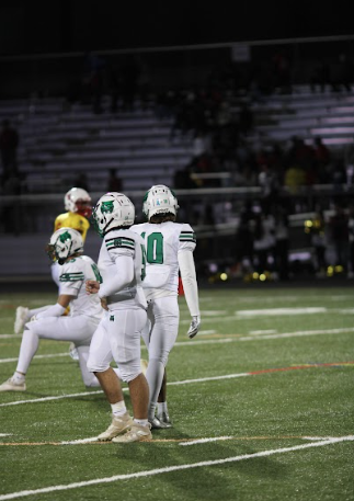 The mighty madcows were loud as the Wildcats came out of a timeout and went back into formation during a 42-0 route of Wheaton. Even with the new athletic policies being passed, the WJ student section remained loud and supported the team during a crucial away game.