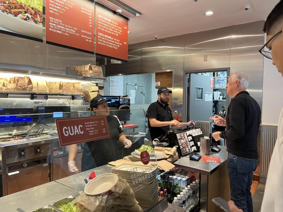 Chipotle employees accommodate a plethora of customers, including WJ students.