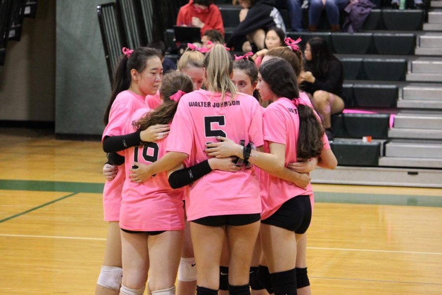 The Wildcats huddle together prior to the start of the game against Quince Orchard. Wildcats won in straight sets, 3-0.