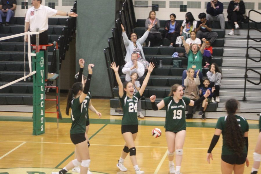 The team and crowd celebrates their win. They will next face second-seed Churchill HS (13-1).