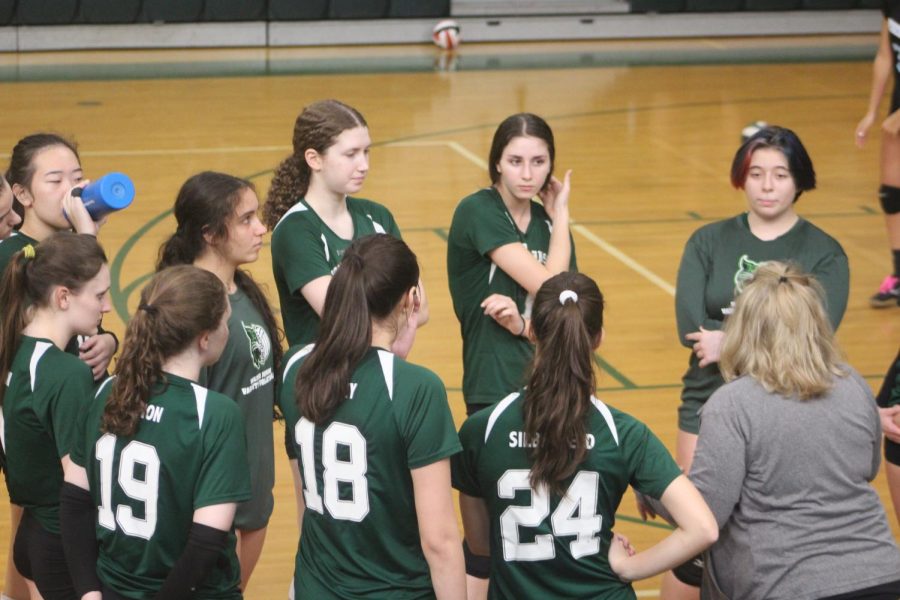 The team huddles together pre-game. The Wildcats beat Whitman Vikings 3-1 on Friday.