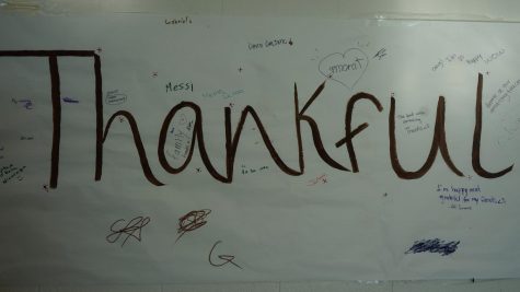 Students from International Club create a mural on the white board for all the things they are thankful for. For students who have just moved to the US, like sophomore Camila Hernandez, this event has shown them what the holiday is all about. “I’m from Colombia; it’s my first Thanksgiving. [This event] makes me know how they celebrate because I dont know anything about [Thanksgiving],” Hernandez said.