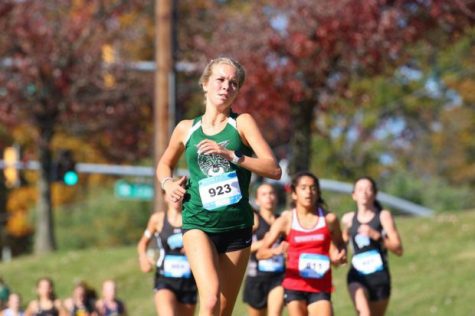 Junior runner Mackenzie Raue runs during regionals. The girls cross country team celebrates their second-place finish at the 4A West Regional Championship. They will be running in the 4A State Championship at Hereford High School on Nov. 12 and hope to blaze past the Wootton Patriots who won regionals and are favored to win the state meet.