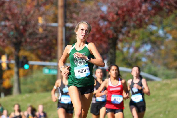 Junior+runner+Mackenzie+Raue+runs+during+regionals.+The+girls+cross+country+team+celebrates+their+second-place+finish+at+the+4A+West+Regional+Championship.+They+will+be+running+in+the+4A+State+Championship+at+Hereford+High+School+on+Nov.+12+and+hope+to+blaze+past+the+Wootton+Patriots+who+won+regionals+and+are+favored+to+win+the+state+meet.