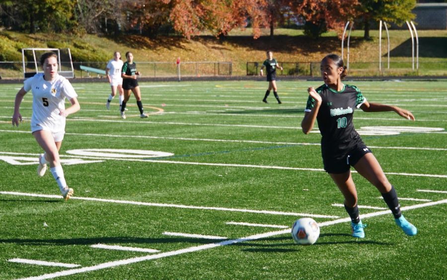 Senior captain and midfielder/forward Aranda Hurge dribbles past a Rockets defender. The Wildcats defeated the Rockets 4-1 as they advanced to the regional final where they will play Whitman on Tuesday.