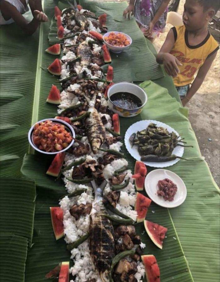 In the Philippines, it is common for events to serve the meals on banana leaves, usually without plates or utensils. This meal is called a boodle feast, and it is traditional to eat with the hands.