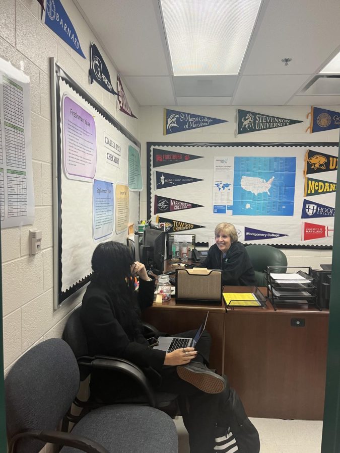 College and career coordinator Gayle Evans helps senior Tiffany Gibson navigate the strenuous college application process. As always, Evans greets students with a smile and ensures all their questions are answered.