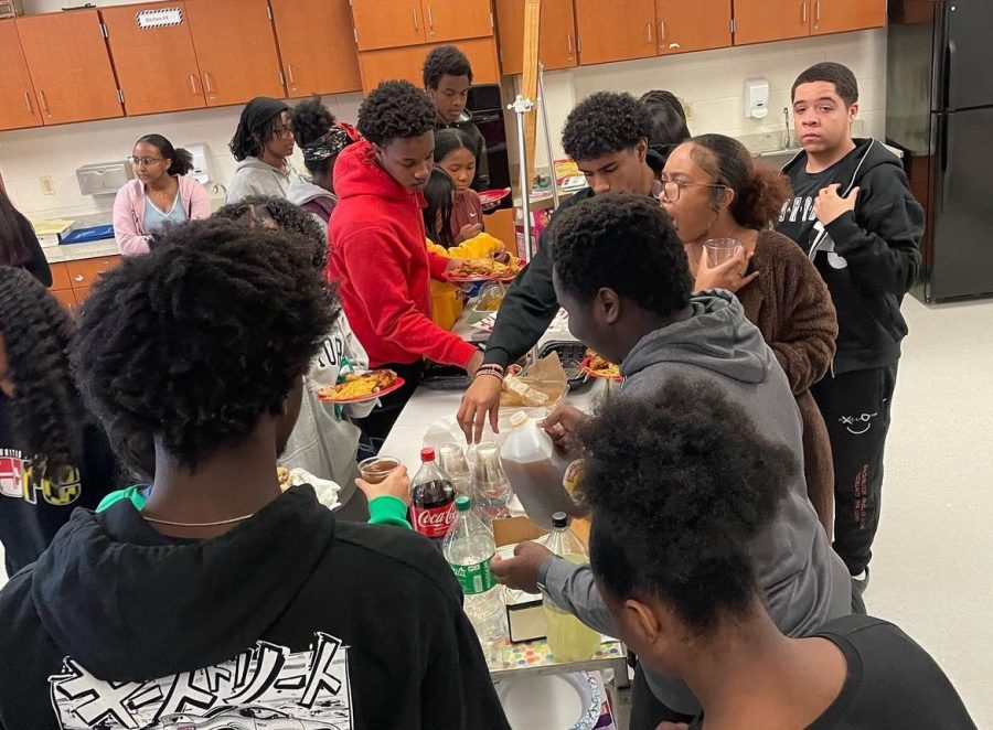 MSP members join together during lunch where they enjoy the food they brought as part of their Thanksgiving Potluck meeting. Some students even brought food from their own culture. They all shared what they were thankful for in a discussion.