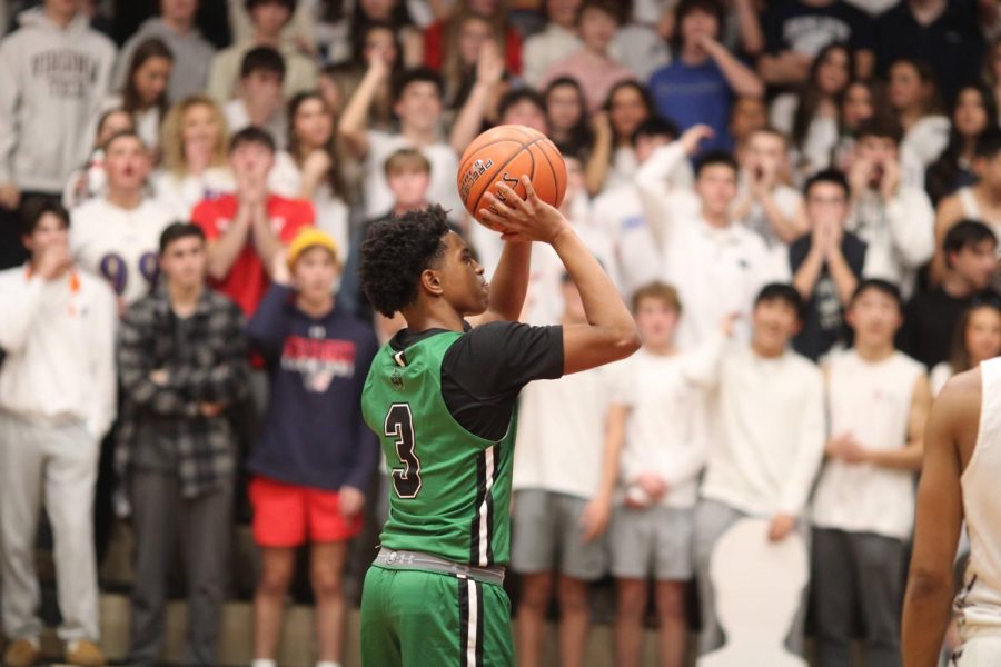 Christion Wright shoots at the line two free throws after getting fouled during a layup. Wright went on to score nine points in the game against Wootton.