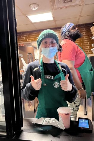 Senior Eva Griebl takes on the holiday rush as a barista at Starbucks. Working during the holidays can especially be overwhelming as a student because of the Starbucks holiday specials.