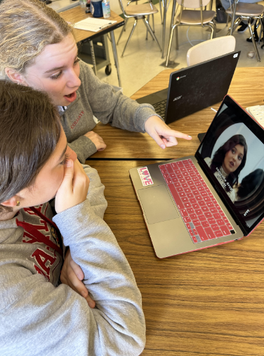 Junior Anna Zucconi and sophomore Zoe Kleinbord watch Keeping up with the Kardashians in shock over a fight between Kendall and Kylie Jenner. The show has been streaming since 2007. “I feel like the sister arguments are so relatable and make me laugh when I watch because I compare them to how me and my sister fight sometimes,” Kleinbord said.