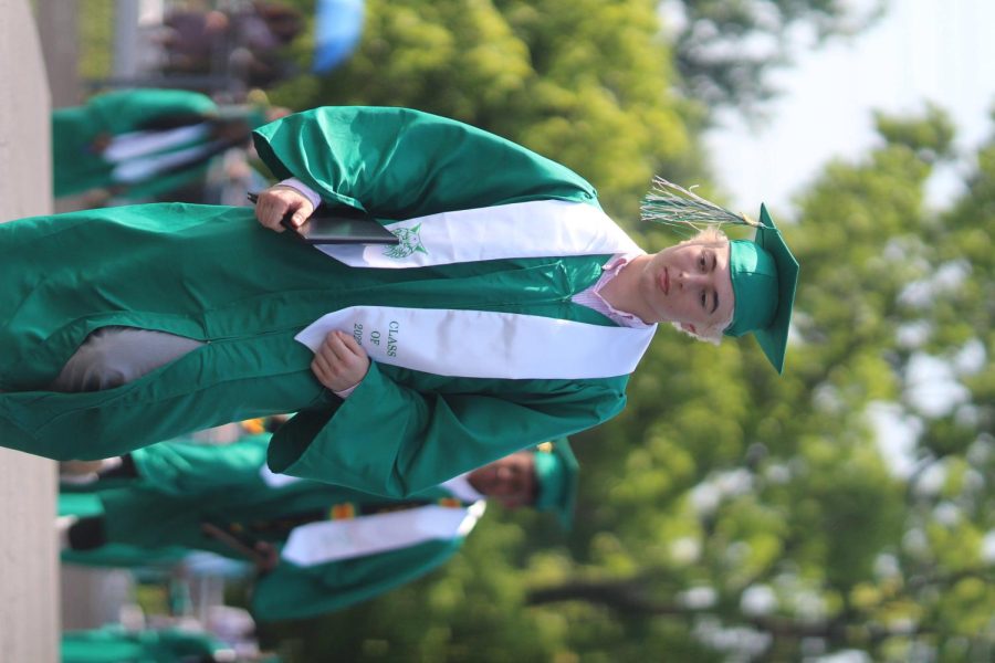 Senior Niko Natsvlishvili walks across the stage after graduating. June saw the graduation of the Class of 2022