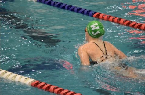 Sophomore Madeleine Simmons swims the 200 Individual Medley (IM) at the meet against Wootton. Senior captain Sienna Karp won this even with a time of 2:06.09 and Simmons came in second with a time of 2:07.28.