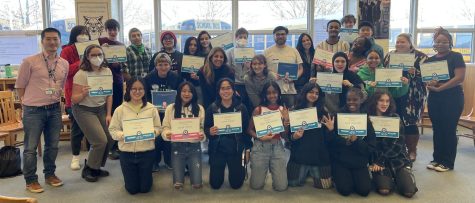 Student and teacher participants of Study Circles show off their certificates they earned for completing the program. After a long and achieving two days they are happy to have participated and been apart of this program.