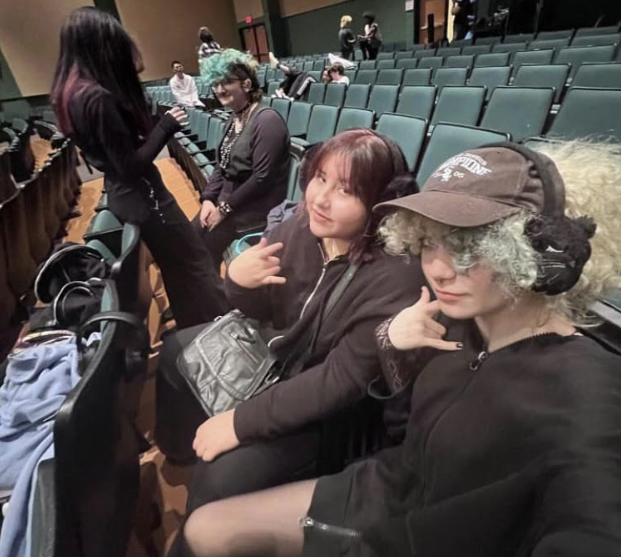 Junior Rey Guteirrez-Micallef and sophomore Ashly Almendras take a break from working on costumes to hang out in the auditorium. Almendras worked as Guteirrez’s costumes assistant this year for The Twlight Zone.