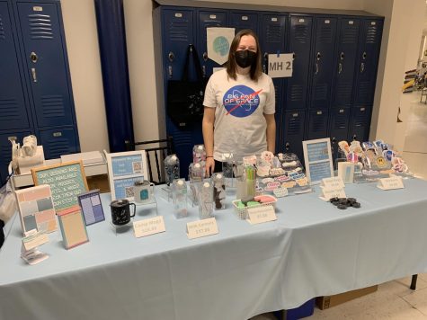 Bonnie Lechner stands behind her pop up shop at Liberty High School. She wanted an outlet where she could show her creative side. “I kind of decided to take the leap and start an Etsy shop…if anyone is thinking of potentially starting their own business or selling something, try it out for a couple months on Etsy and see how it does because it is a really forgiving platform,” Lechner said.