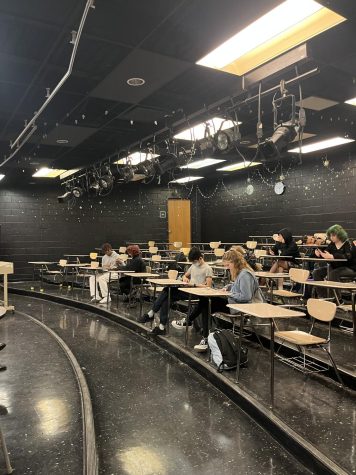 An English-theater combo classroom has possibly the most uncommon design in the school. An entirely black-colored space with ascending desks that face a stage-like area is the perfect set up for theater students to learn.