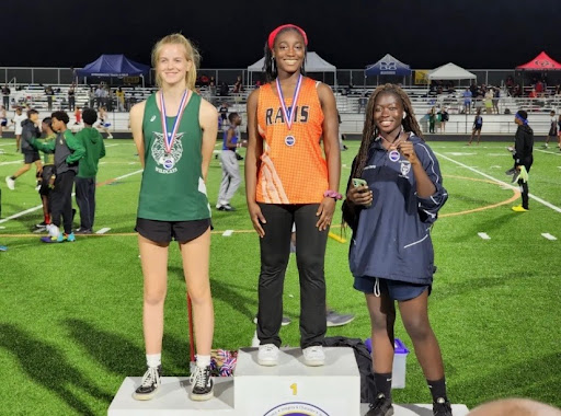 Junior thrower Sarah Watson (first from the left) receives a medal after placing second in 2022 outdoor regionals for discus. The meet took place on May 18-19, after a long season of training and hard work. Watson went on to place fifth at states.