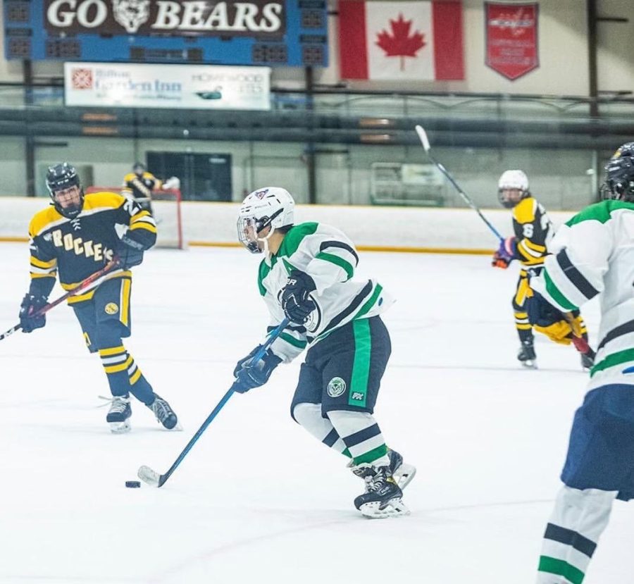 Junior assistant captain and left wing Brendan Klotz controls the puck in the Icecats defensive zone. The Icecats have continuously had success breaking out of the defensive zone and quickly shifting into offensive attacks.