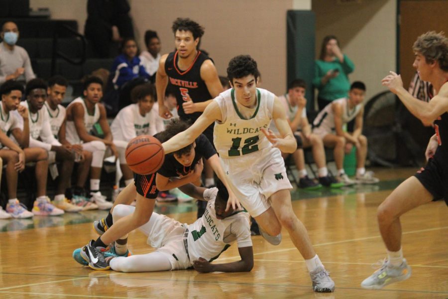 Sophomore Jordan Silverstein races down the court on a fast break. The Rockville game was the first victory the Wildcats had in six games.