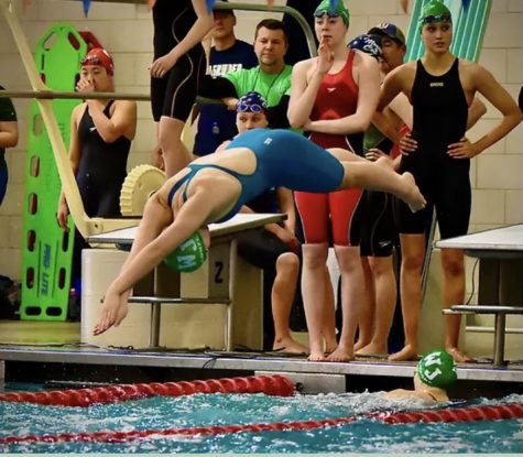Senior captain Maren Conze starts her race at regionals. She will be competing in the 200 freestyle and the 100 backstroke in the 4A State Championship on Feb. 25.