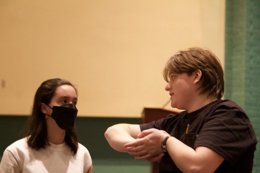 Student technical director Maria Cabrera-Martin and new tech director Mae Mironer discuss work for the upcoming show, The Addams Family Musical. The student TD and TD work closely together throughout the process of bringing the technical side of a show to life.