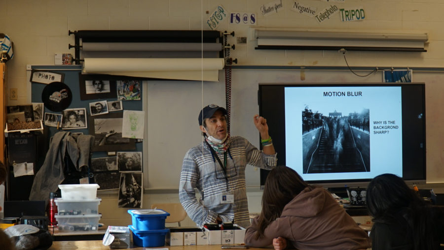 Veteran photography teacher Daniel Kempner instructs a first year course in the techniques of the art form.