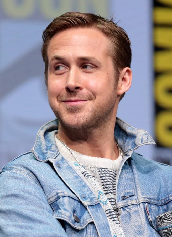 Ryan Gosling listens to Harrison Ford at 2022s Comic Con. The duo had starred together in Blade Runner 2049.