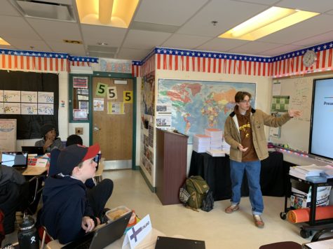Model UN President senior Max Turnacioglu explains the various aspects of participating in a conference during a club meeting. The club is excited for a return to an in person conference format this year following a long period of virtual conferences.