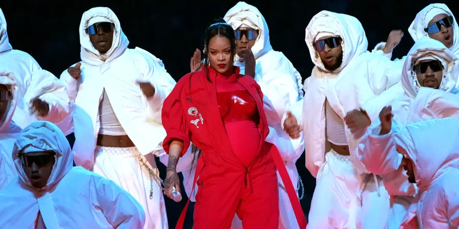 Rihanna performs at the 2023 Super Bowl Halftime Show. The performance received mixed signals: some were disappointed by her minimal production, while others were awed by the flow and dancework. She will be joining Drake at prom in May to perform in front of the senior class.