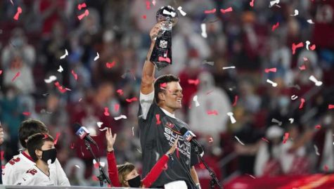 Tom Brady hoists his 7th Vince Lombardi Trophy, which is more than any NFL team has.