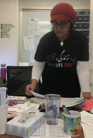 French teacher Farah Kinani wearing a shirt supporting the womens movement in Iran. “I have learned that what matters the most in teaching is the relationship with the student. You are able to personalize the teaching and in a language class that’s important because you have to make them vulnerable in class and be able to make mistakes,” Kinani said.