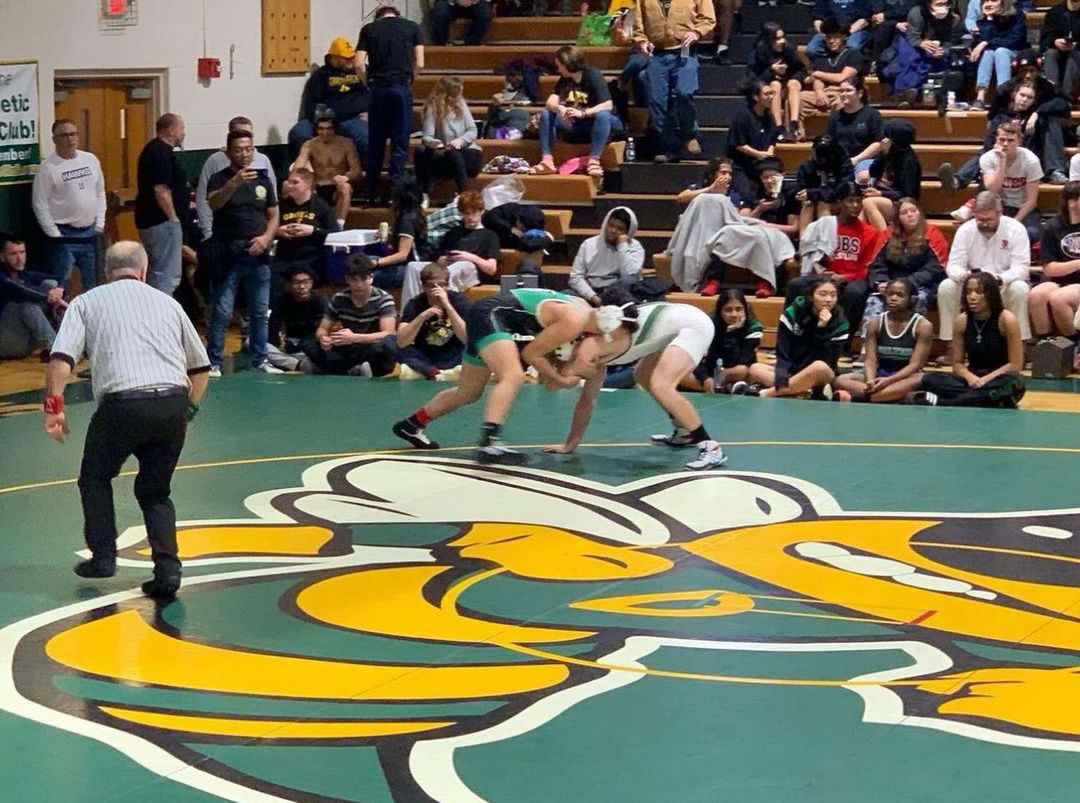 Senior Enzo Yamasaki wrestles at the 4A West Regional Championship. He went 4-1, finishing third place in his weight class.