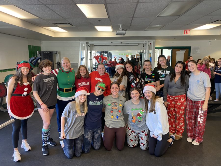 The Girls Lacrosse team shows their preseason spirit during a training session. This was a lifting session for the team to get stronger and excited for the upcoming season.