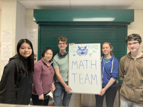 WJ Math Team after participating in a fundraiser for their club featuring club president Camilla Digoussar and club sponsor Xiao Chen. WJ Math Team is determined to make an impact in their upcoming competitions as a collective.