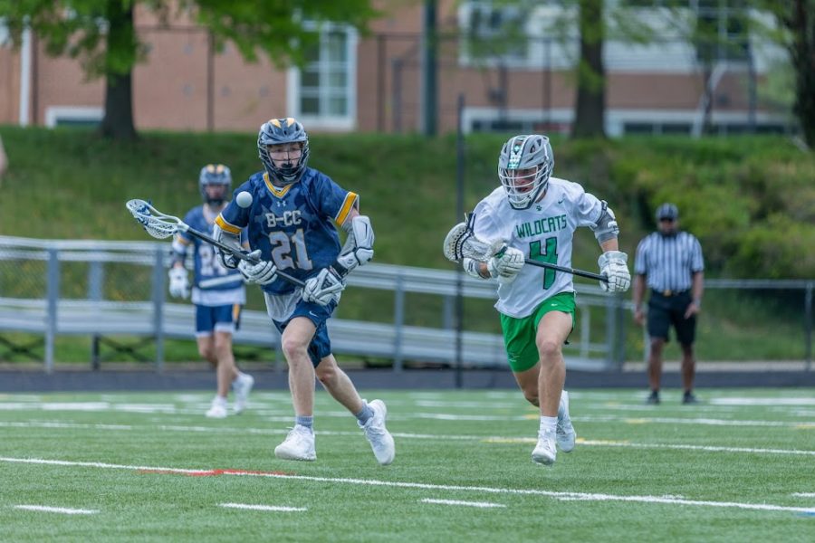 Junior+midfielder+Nick+Zampardi+cradles+the+ball+up+the+field+in+the+Wildcats+7-6+victory+over+the+BCC+Barons.+This+was+the+first+time+in+six+years+that+the+boys+lacrosse+team+beat+BCC+and+the+win+snapped+the+Wildcats+three-game+losing+streak.