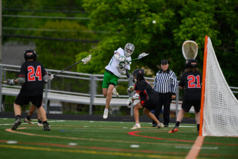 Junior captain and attacker Noah Diamond takes a shot in a 16-10 win over the Rockville Rams on Thursday, May 4. Diamond had six goals in the game as the Wildcats ended their regular season with a 7-4 record.