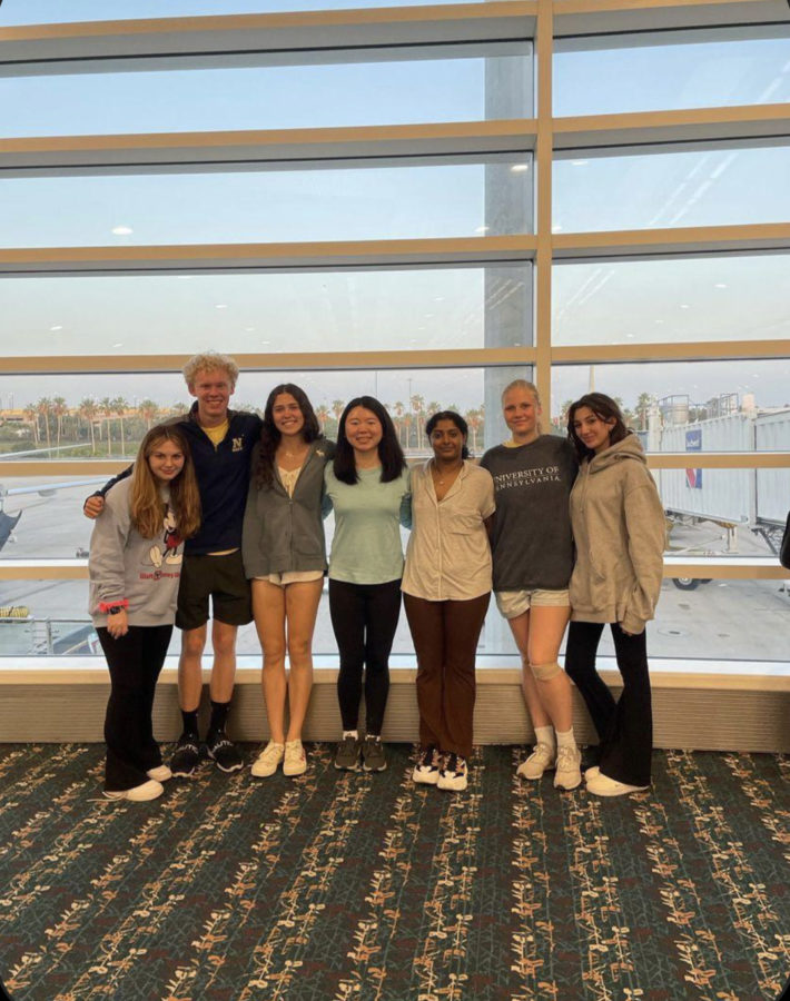 The seven students (from left to right) Amanda Simesnky, Frans Rejsjo, Daniela Znam, Allison Xu, Yashuwini Jaykubar, Brett Wall, and Jordan Block are at the BWI airport ready to fly out to Orlando for a good time at DECA ICDC.